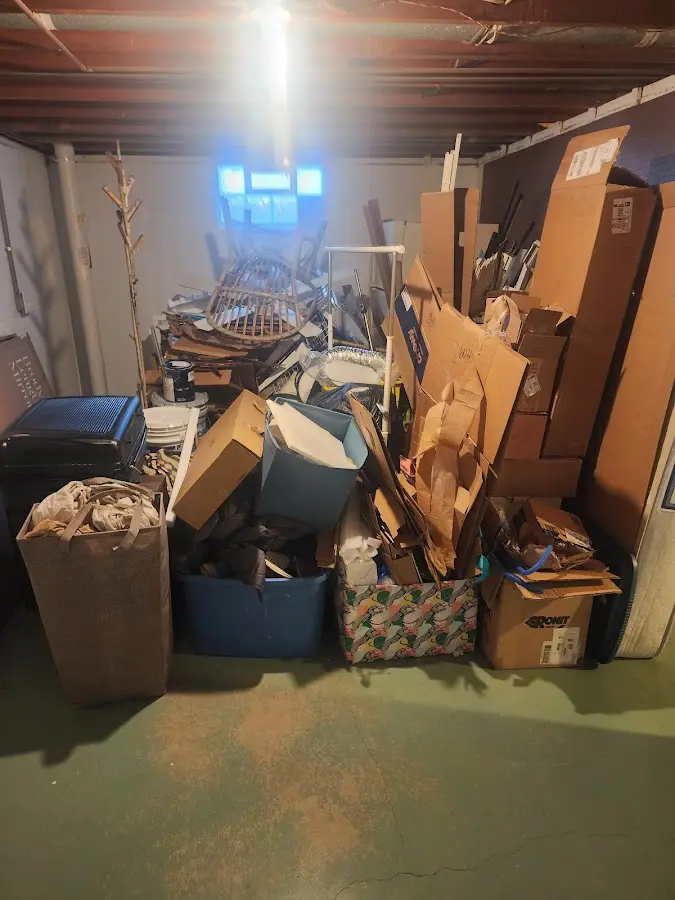 Roll-off dumpster container at job site for 8 Yard Dumpster Rental in Monroe